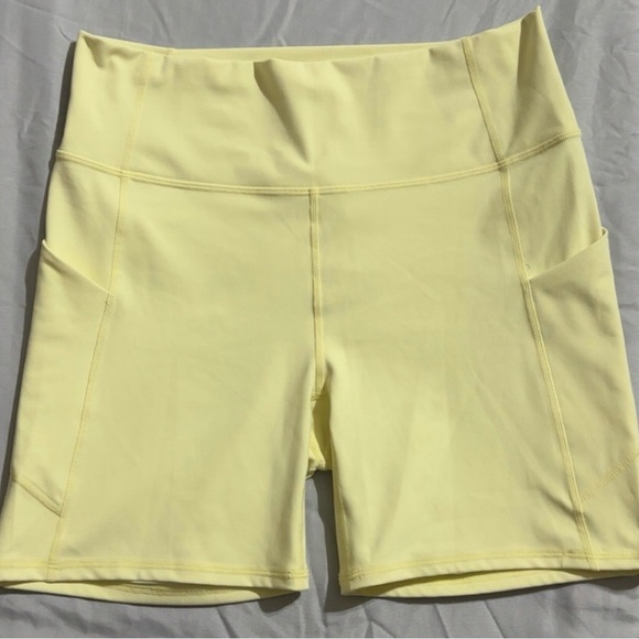 Fabletics Pants - Fabletics Pure Luxe High Waisted Pastel Yellow Bike Shorts 6”